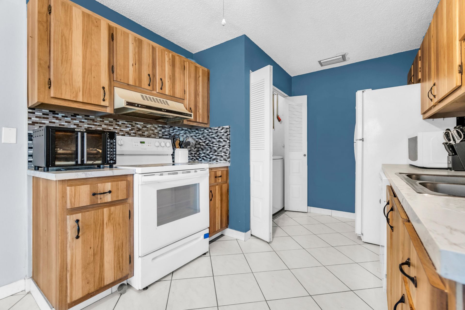 3360 NE Rossi Court Ne, West Palm Beach, FL 33417 Photo