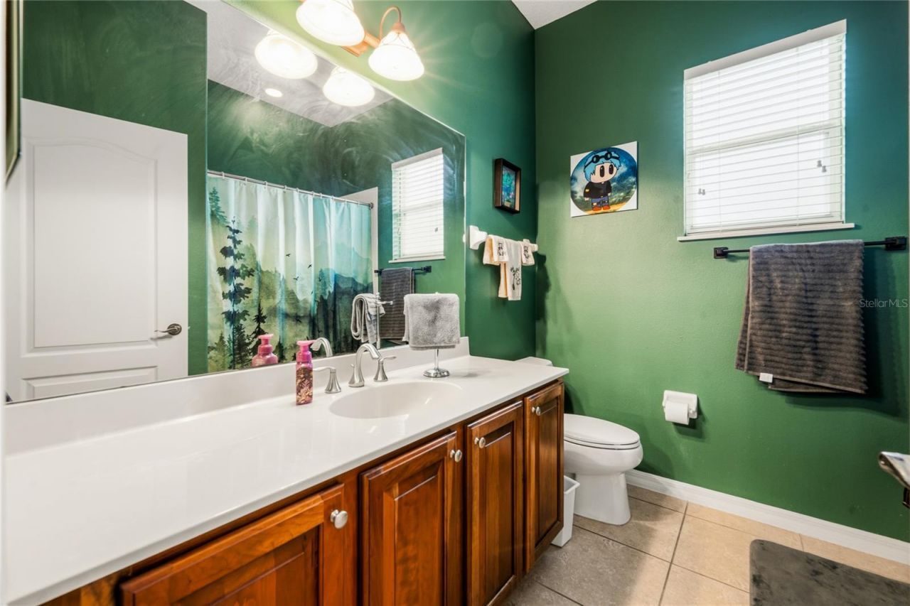 5977 Lake Melrose Drive, Orlando, FL 32829 Photo