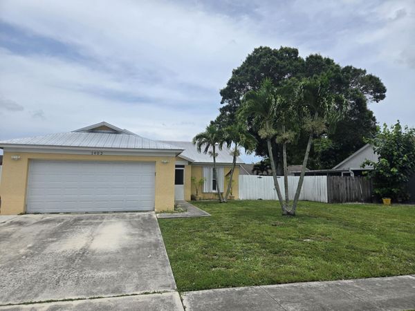 1402 Denlow Lane, Royal Palm Beach, FL 33411