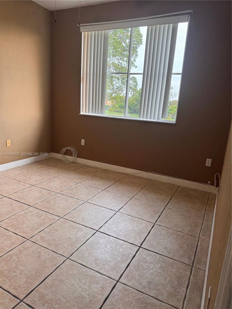 7070 NW 177th St , Unit 203-10, Hialeah, FL 33015 Photo