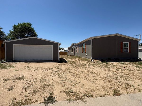 103 Beach Dr, Log Lane Village, CO 80705