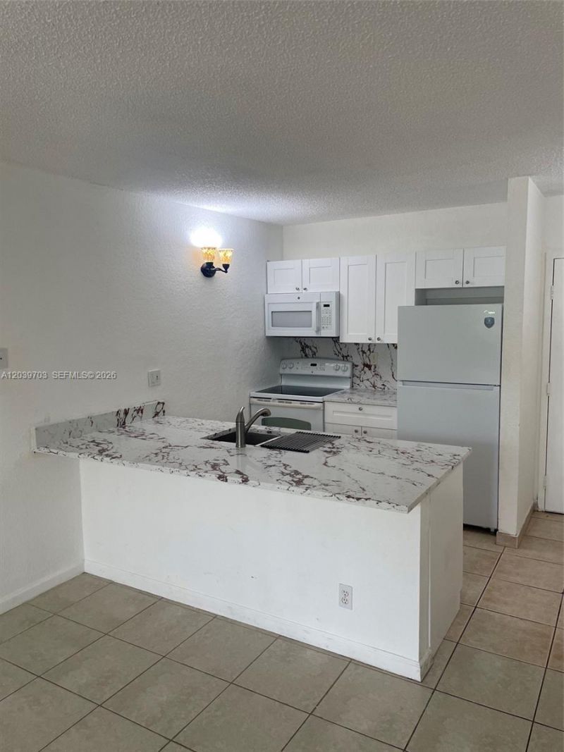 2401 Riverside Dr , Unit 203-B, Coral Springs, FL 33065 Photo
