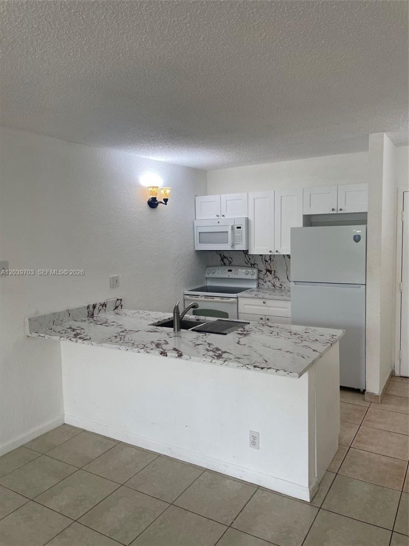 2401 Riverside Dr , Unit 203-B, Coral Springs, FL 33065 Photo