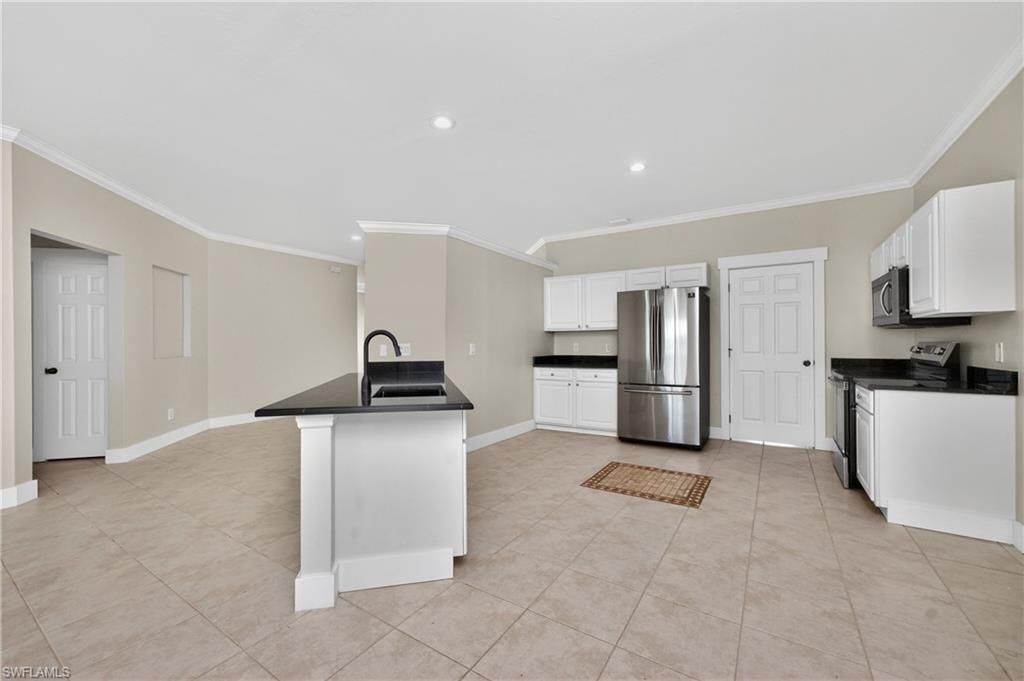 3310 SW 26th Ave , Cape Coral, FL 33914 Photo