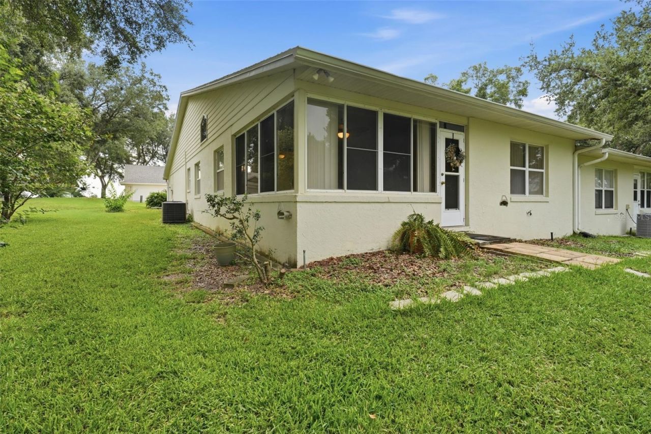 8928 Village Green Boulevard , Clermont, FL 34711 Photo