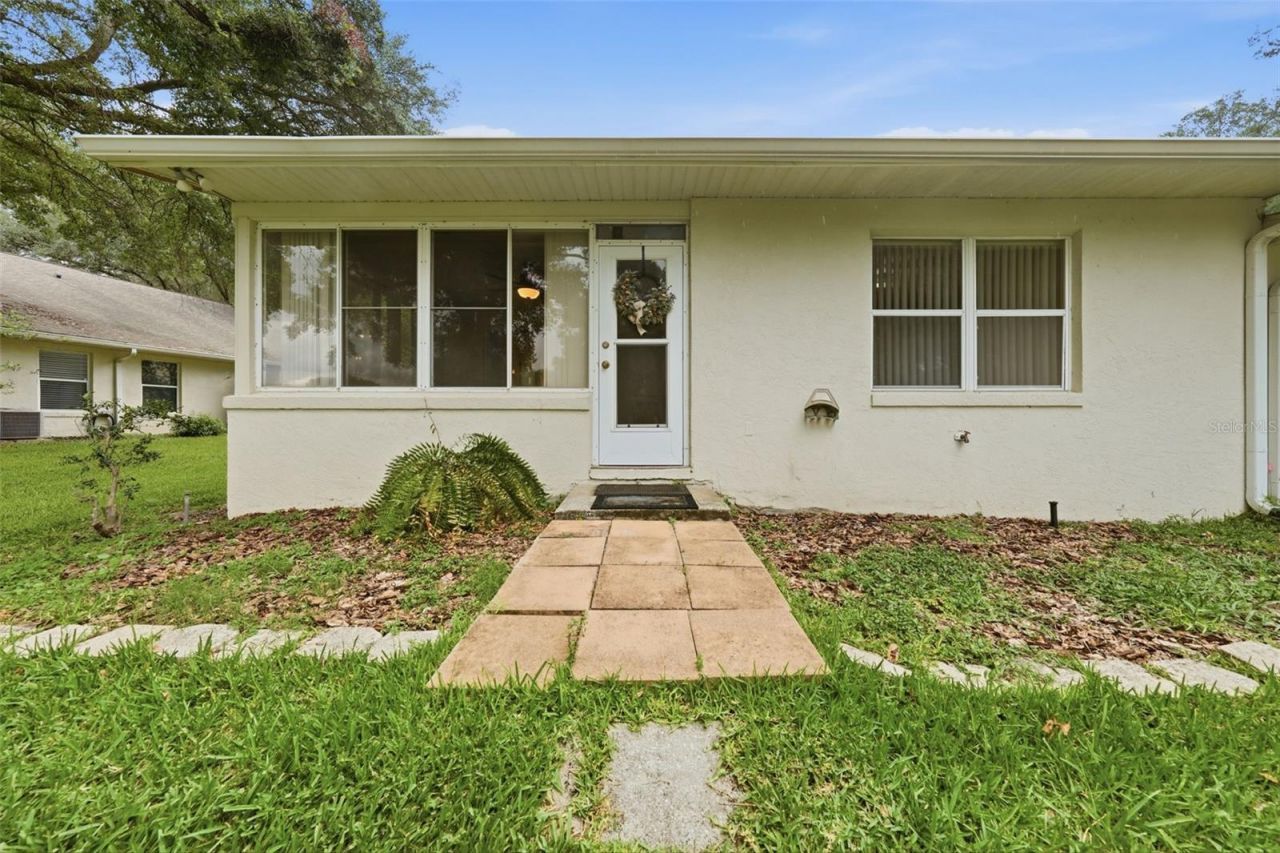 8928 Village Green Boulevard , Clermont, FL 34711 Photo