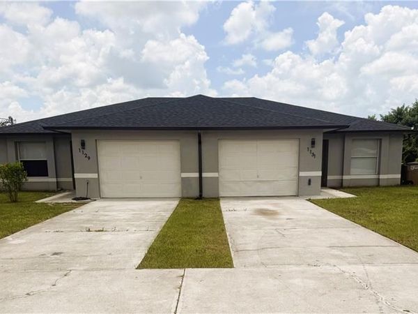 1129/1131 Ivan AVE S, LEHIGH ACRES, FL 33973