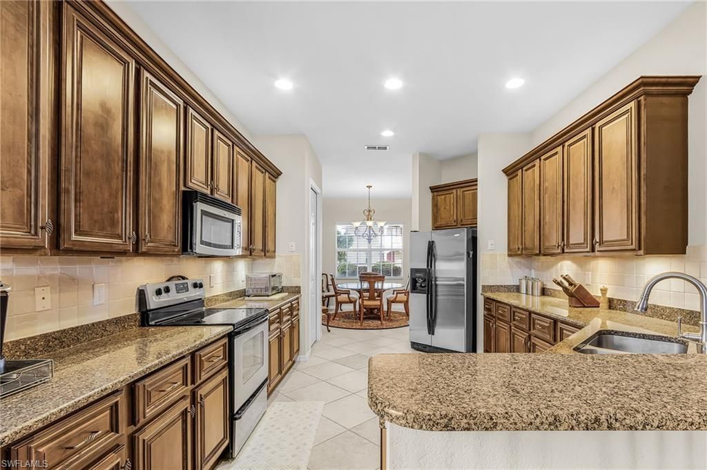 9132 Leatherwood Loop, Lehigh Acres, FL 33936 Photo