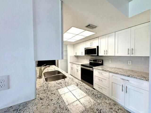 100 Crestwood Court N, Unit 108, Royal Palm Beach, FL 33411 Photo