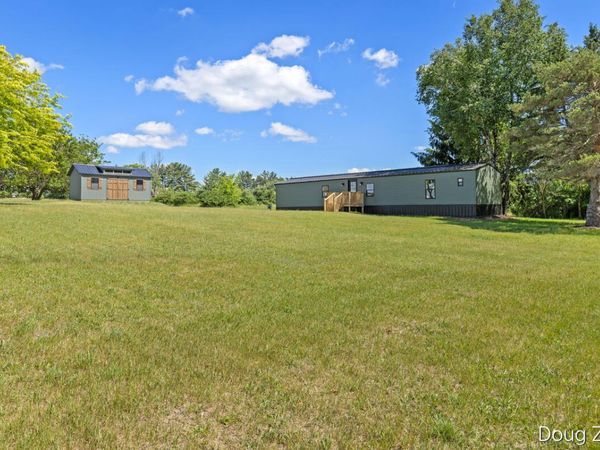 1595 N County Line Road, Six Lakes, MI 48886