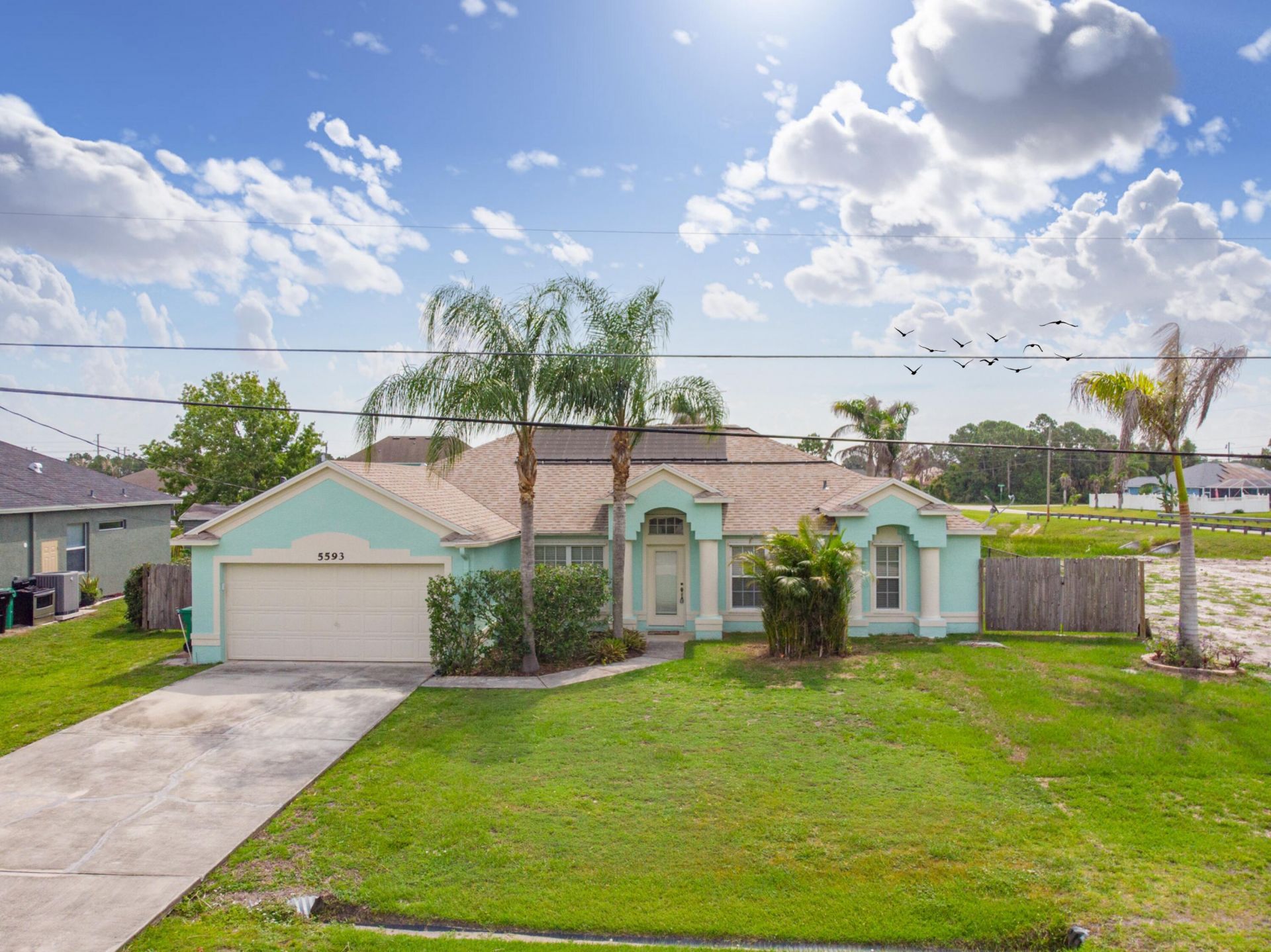 5593 NW Wesley Road, Port Saint Lucie, FL 34986 Photo
