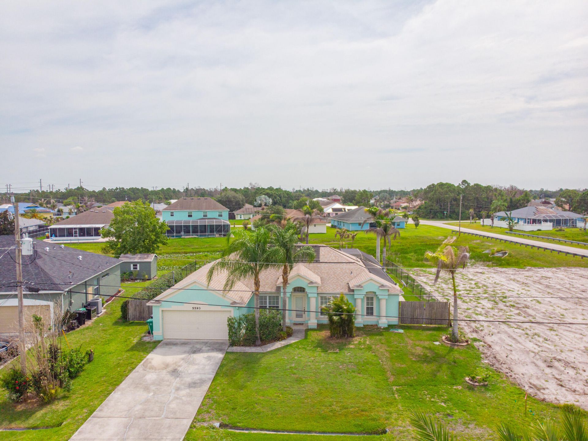 5593 NW Wesley Road, Port Saint Lucie, FL 34986 Photo