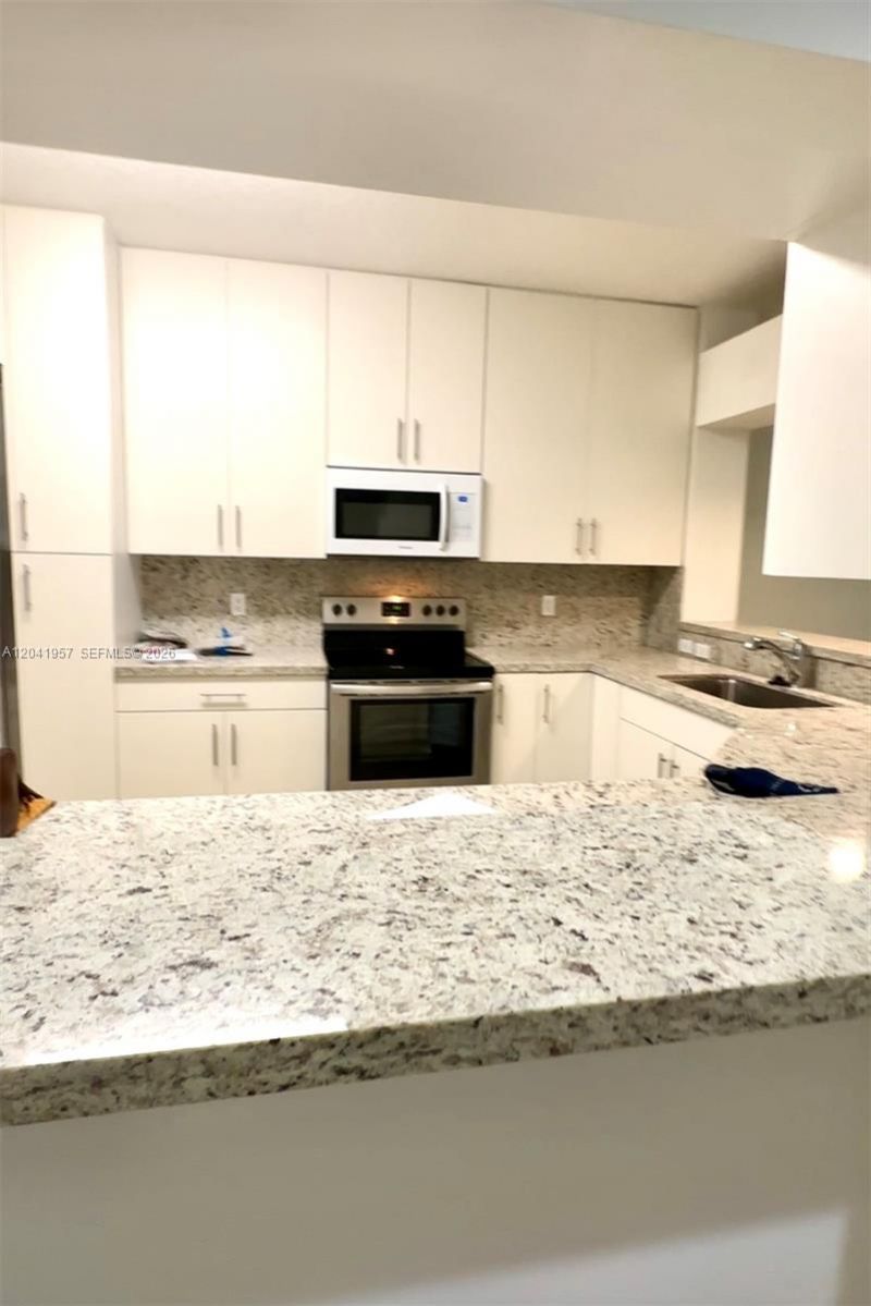 10750 NW 66th St , Unit 214, Doral, FL 33178 Photo