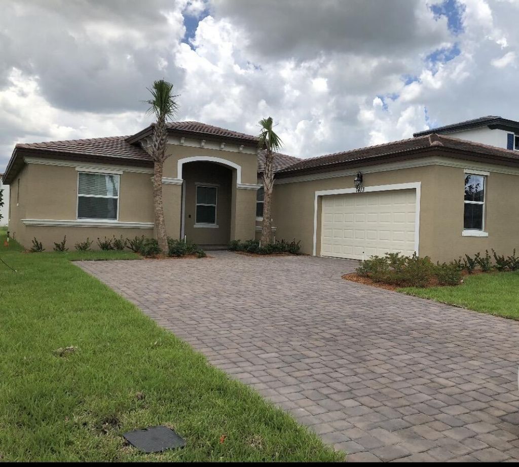 7413 NW Greenspring Street, Port Saint Lucie, FL 34987 Photo