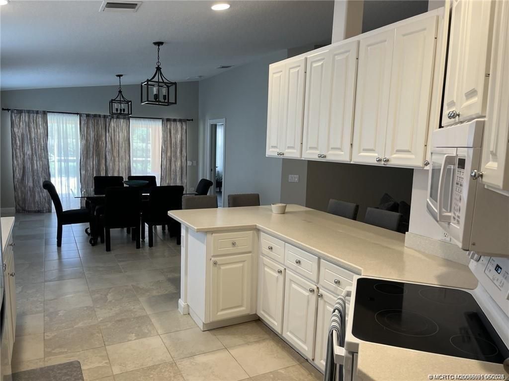 10629 SW Hartwick Drive, Port Saint Lucie, FL 34987 Photo