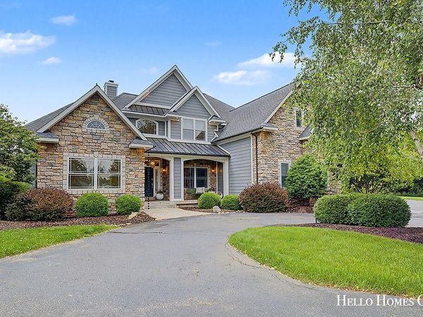 5327 Canyon River Drive NE, Ada, MI 49301