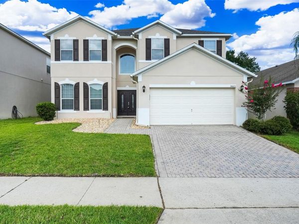26023 MEADOW BREEZE LANE, LEESBURG, FL 34748