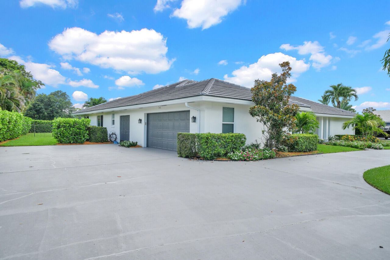 341 Glenbrook Drive, Atlantis, FL 33462 Photo