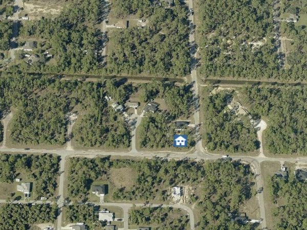 107 Moore Avenue, Lehigh Acres, FL 33936