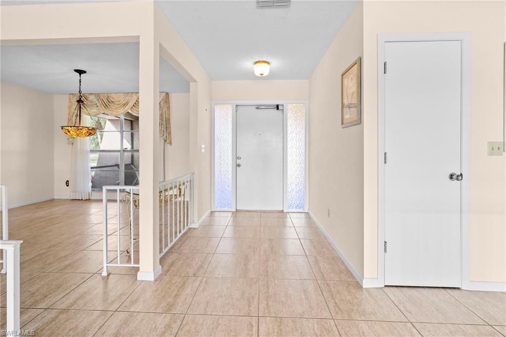 711 Mirror Lakes Dr , Lehigh Acres, FL 33974 Photo