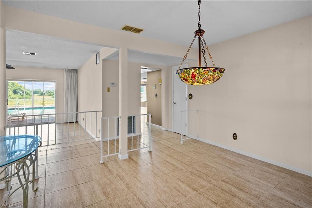 711 Mirror Lakes Dr , Lehigh Acres, FL 33974 Photo