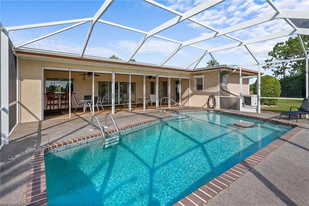 711 Mirror Lakes Dr , Lehigh Acres, FL 33974 Photo