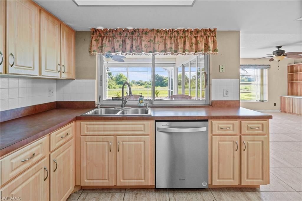 711 Mirror Lakes Dr , Lehigh Acres, FL 33974 Photo