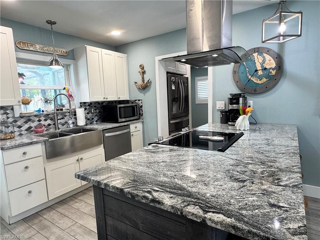 3772 Tropical Point Dr, Saint James City, FL 33956 Photo