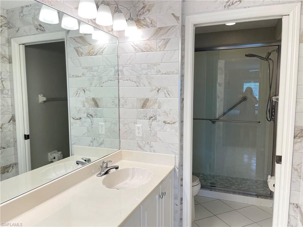 9009 Michael Cir , Unit 1-110, Naples, FL 34113 Photo