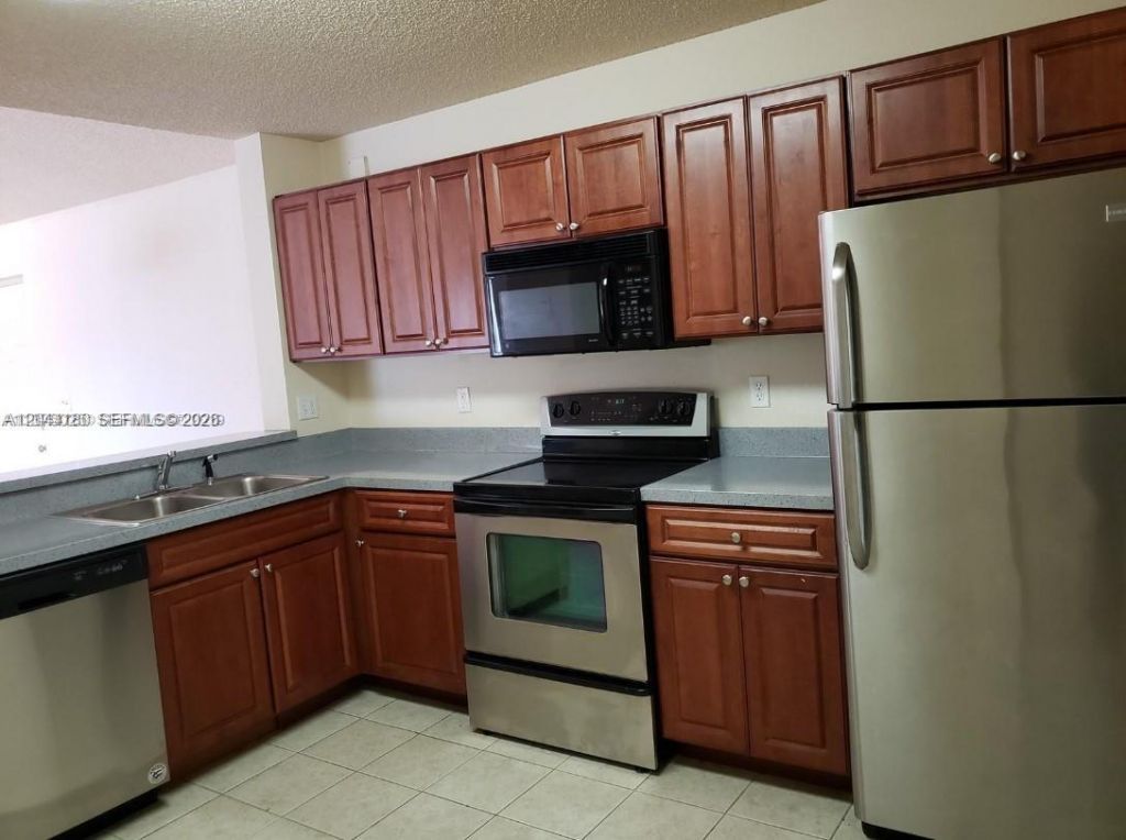 10105 W Sunrise Blvd , Unit 303, Plantation, FL 33322 Photo