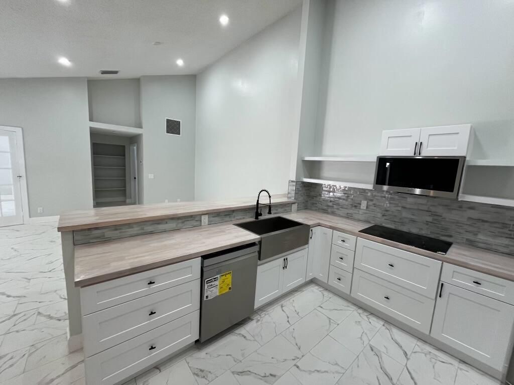 4397 Woodstock Drive, Unit A, West Palm Beach, FL 33409 Photo