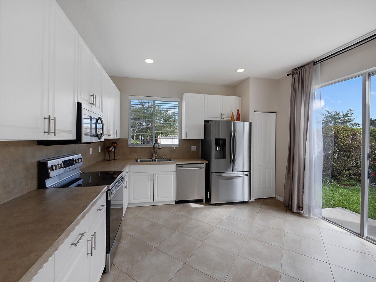 9563 SW Flowermound Circle, Port Saint Lucie, FL 34987 Photo