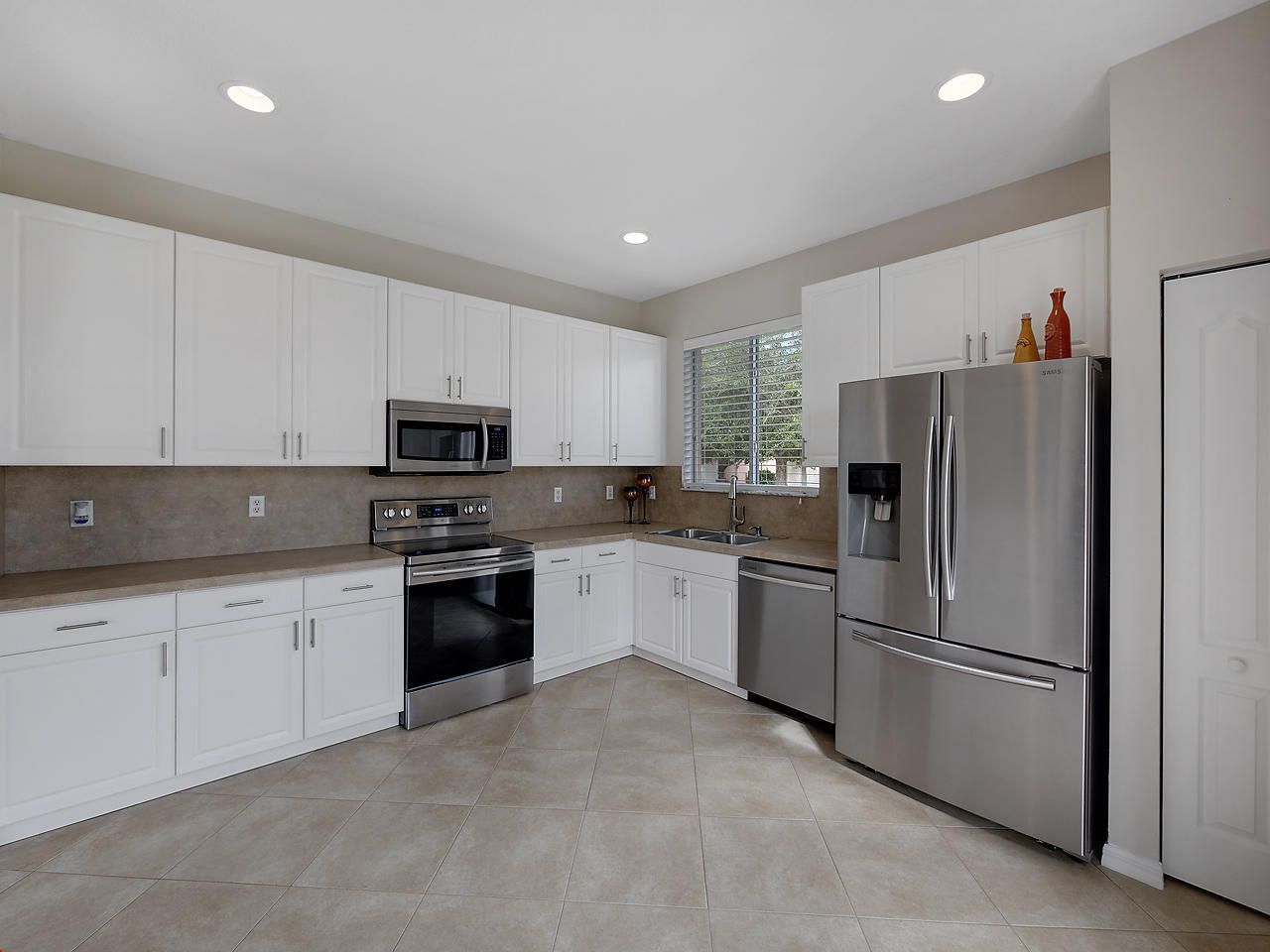 9563 SW Flowermound Circle, Port Saint Lucie, FL 34987 Photo