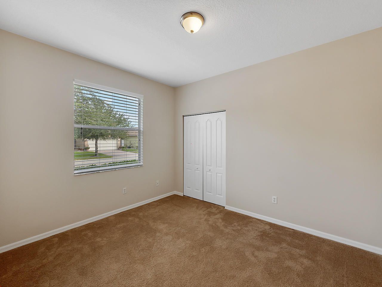 9563 SW Flowermound Circle, Port Saint Lucie, FL 34987 Photo
