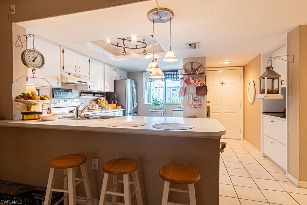 130 Cypress Way E, Unit 1, Naples, FL 34110 Photo