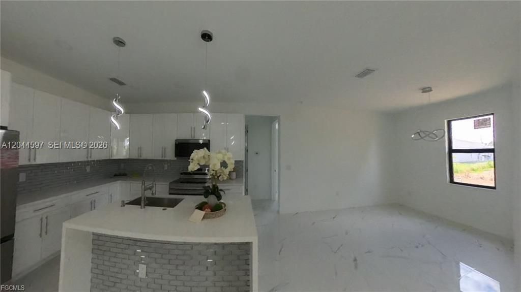 3004 SW 4th St , Lehigh Acres, FL 33976 Photo