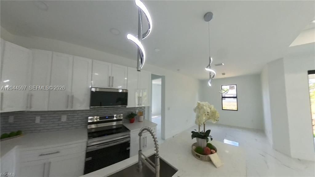 3004 SW 4th St , Lehigh Acres, FL 33976 Photo