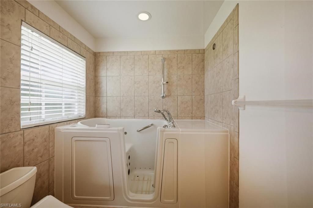 3033 Driftwood Way , Unit 3407, Naples, FL 34109 Photo
