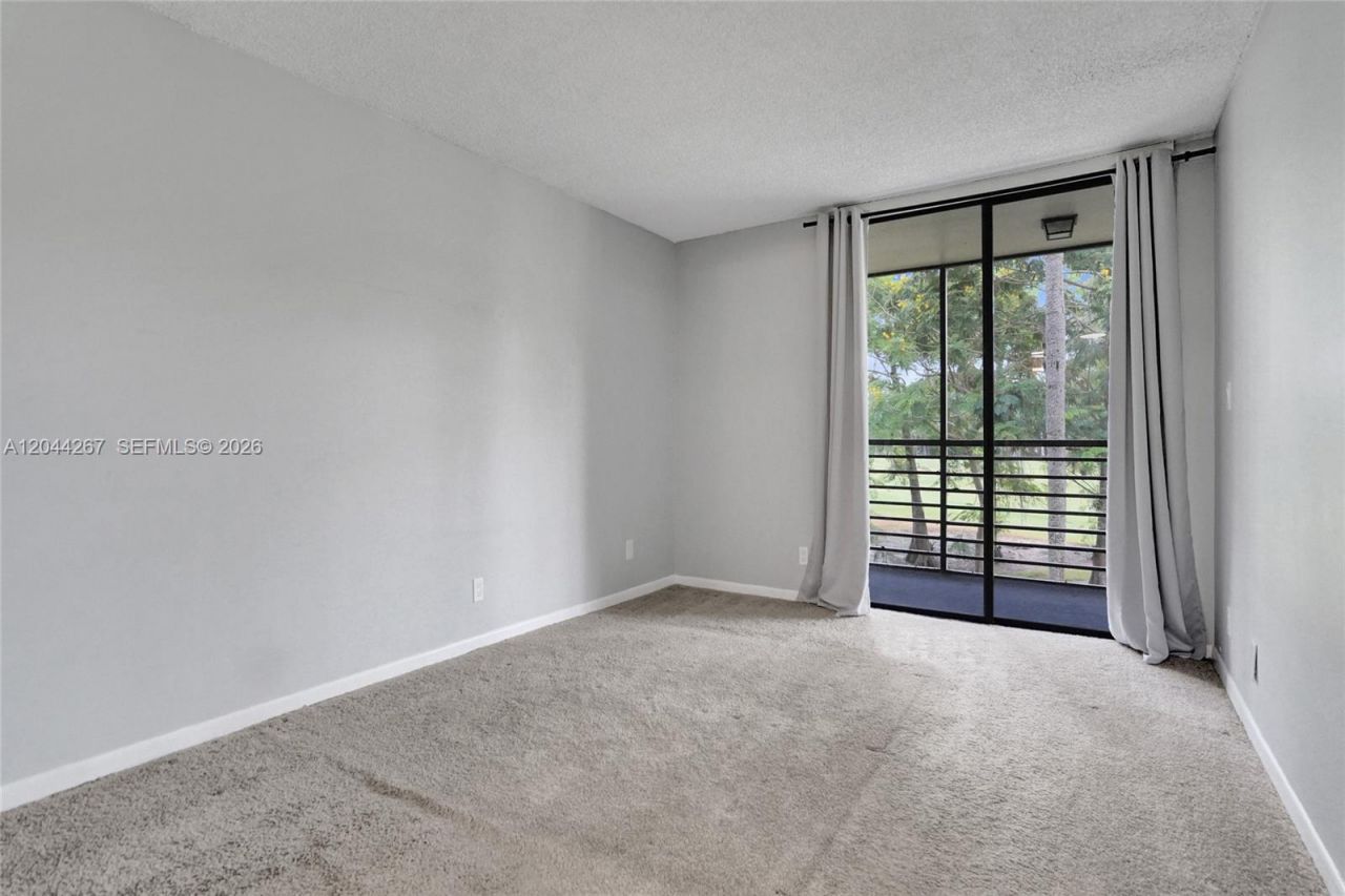 7850 W Mcnab Rd , Unit 210, Tamarac, FL 33321 Photo