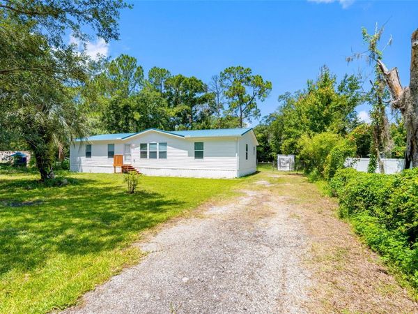 6847 WOODSMAN DRIVE , WESLEY CHAPEL, FL 33544