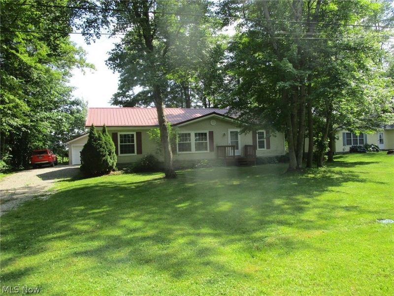 888 Long Shadow Lane, Roaming Shores, OH 44085 Photo 1