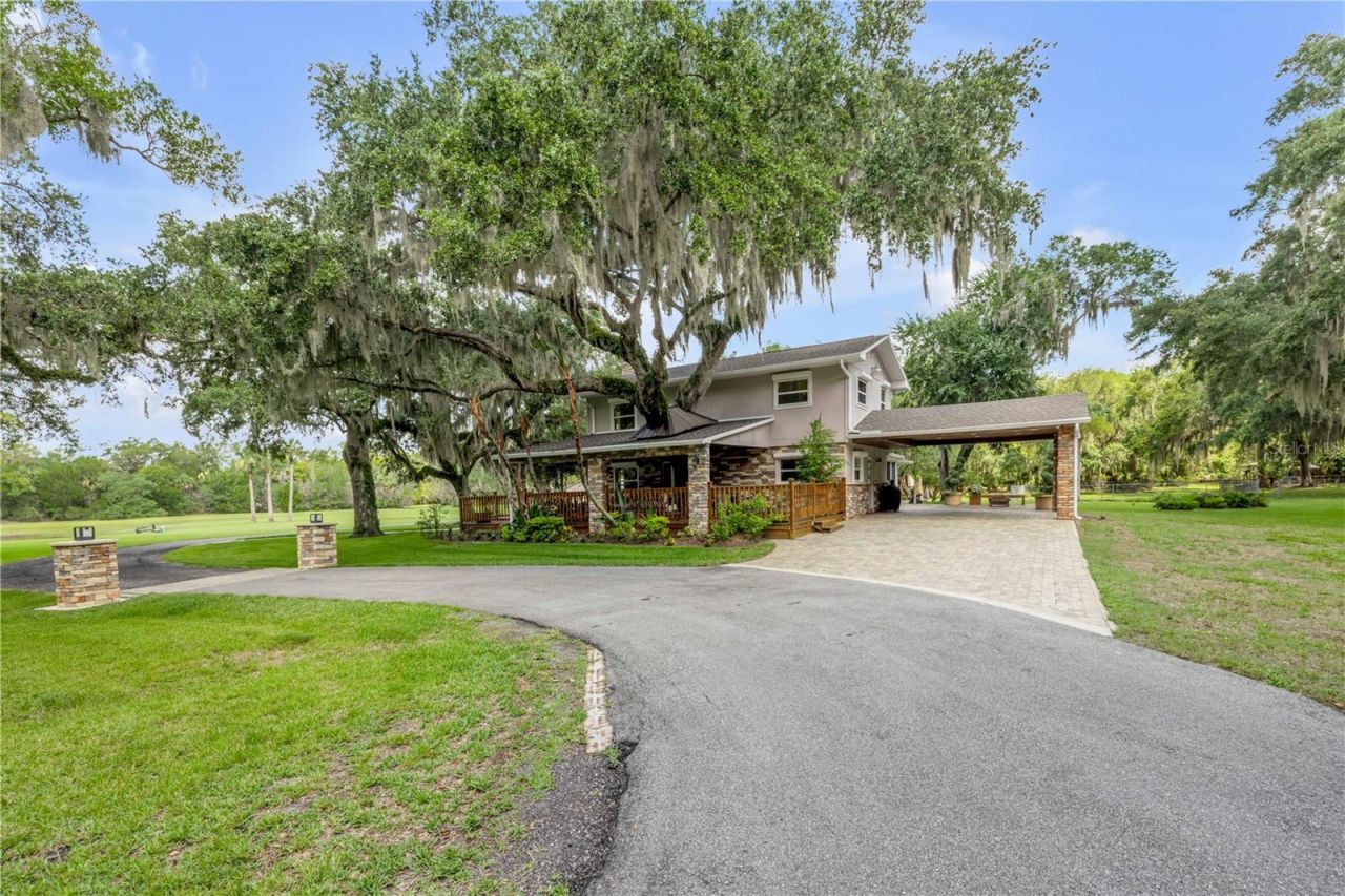 800 Hidden Oaks Lane, Oak Hill, FL 32759 Photo