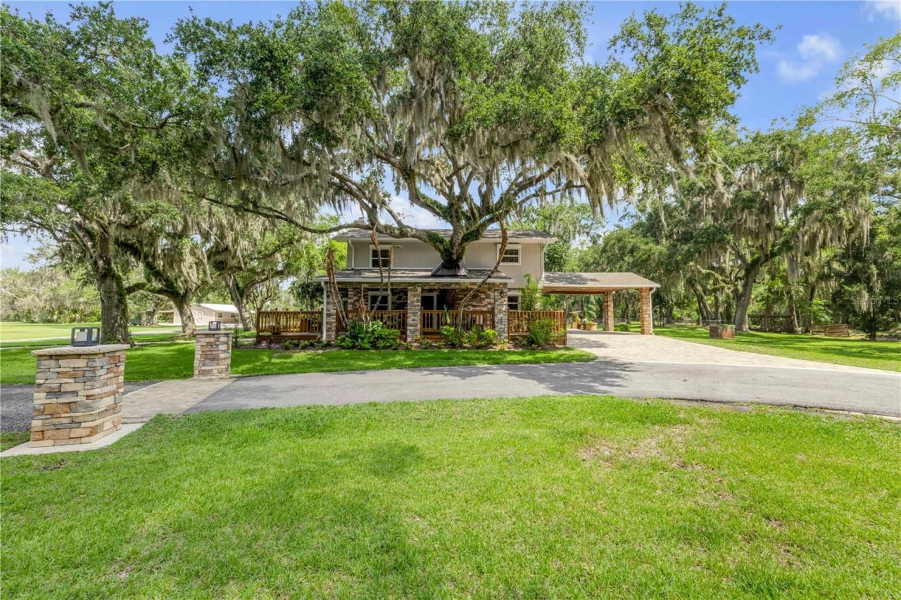 800 Hidden Oaks Lane, Oak Hill, FL 32759 Photo