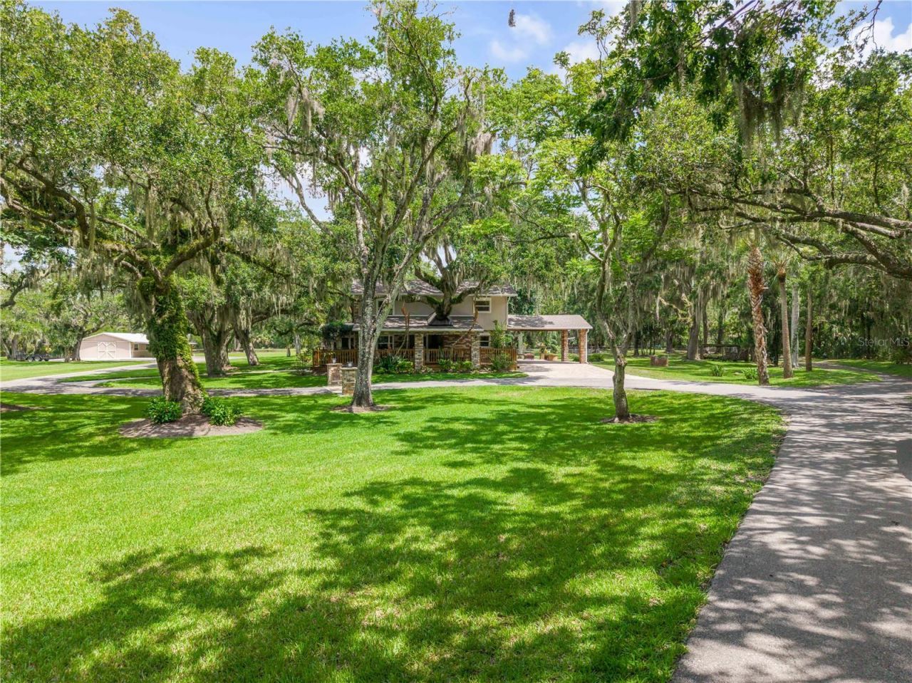 800 Hidden Oaks Lane, Oak Hill, FL 32759 Photo