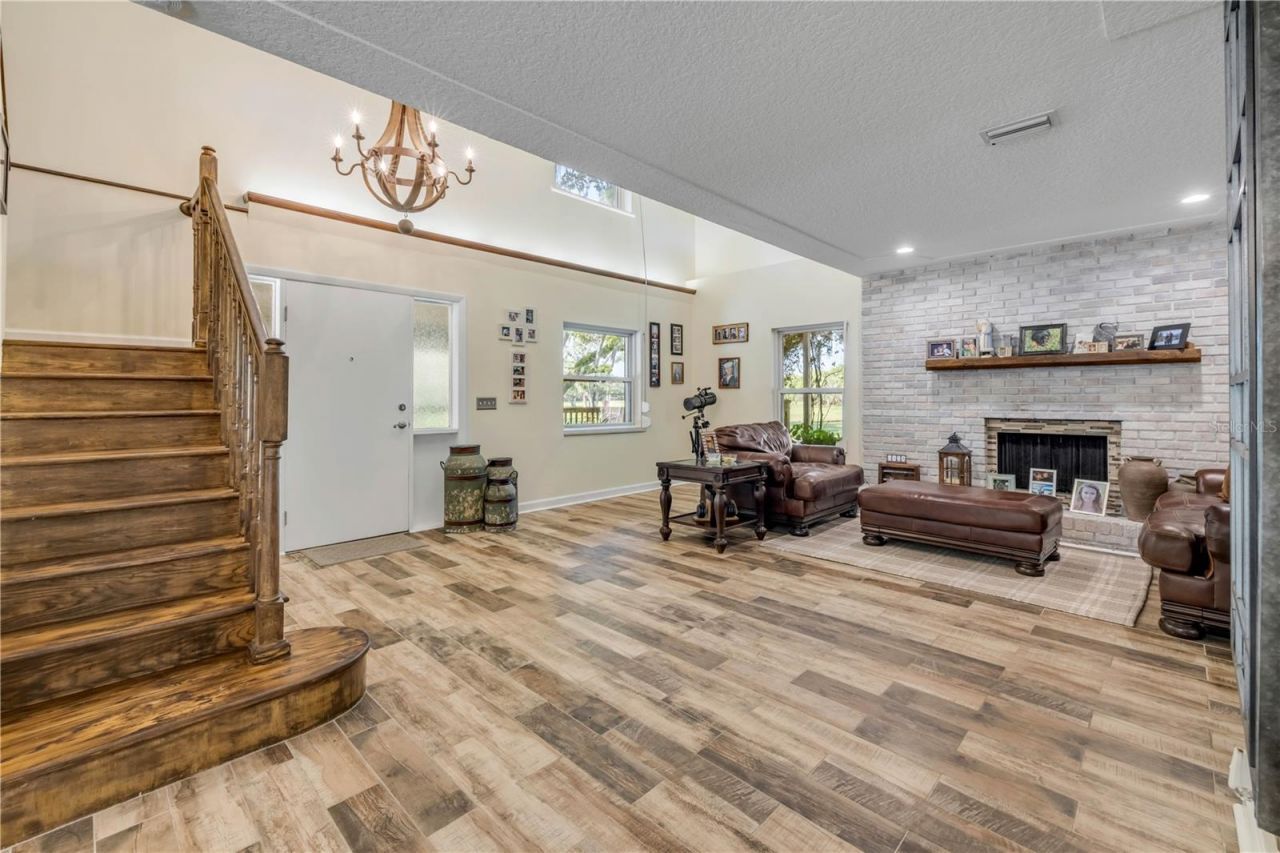 800 Hidden Oaks Lane, Oak Hill, FL 32759 Photo