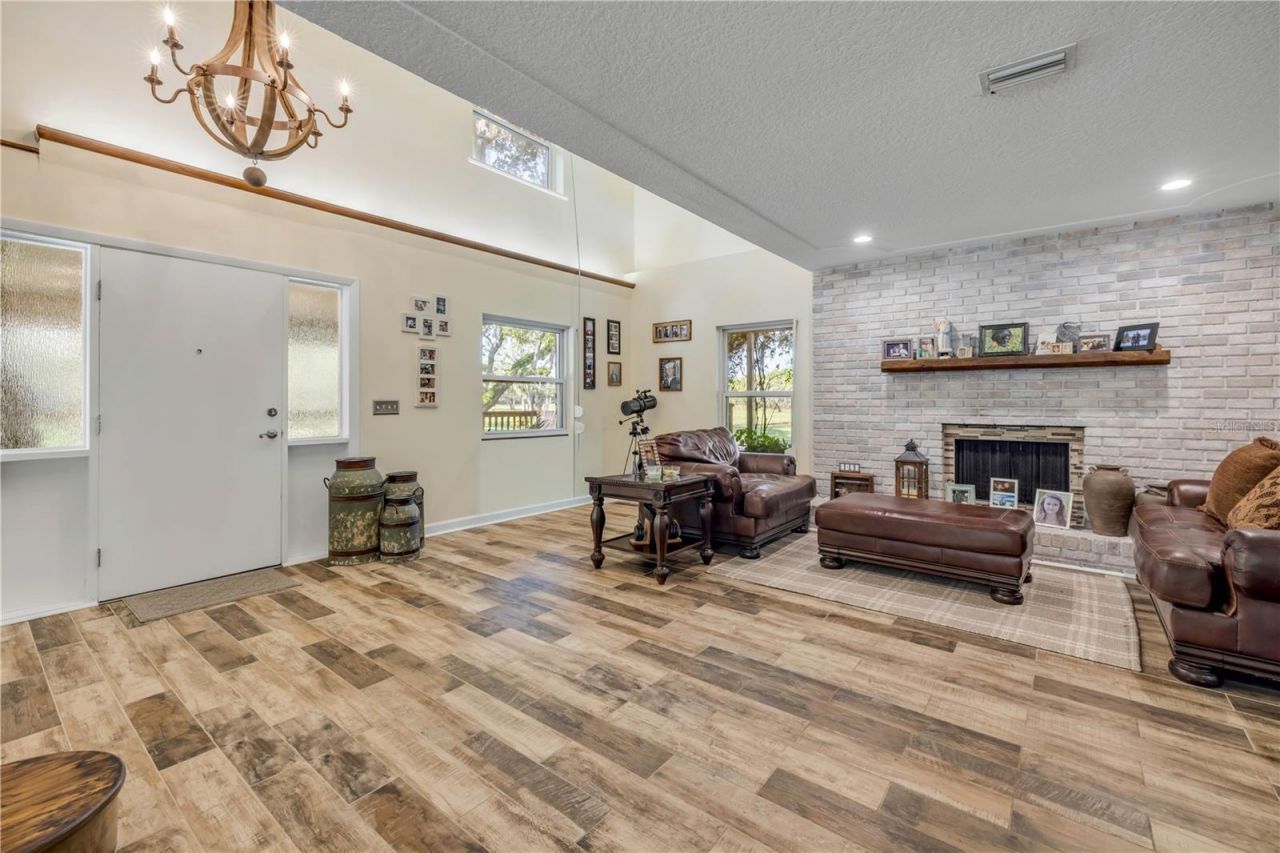 800 Hidden Oaks Lane, Oak Hill, FL 32759 Photo