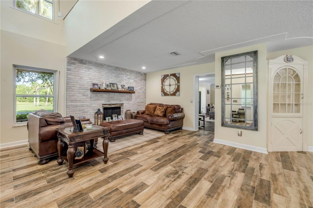 800 Hidden Oaks Lane, Oak Hill, FL 32759 Photo