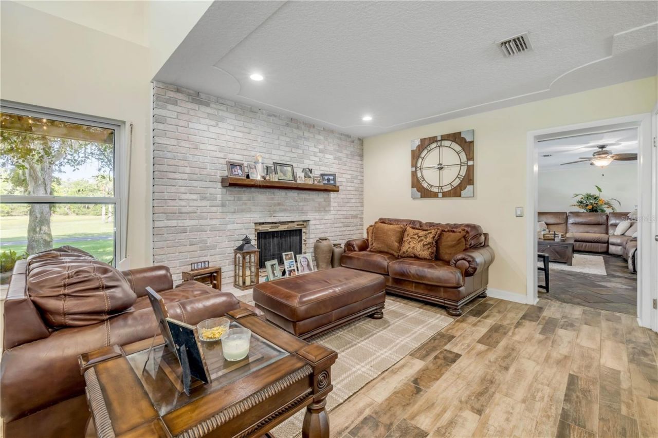 800 Hidden Oaks Lane, Oak Hill, FL 32759 Photo