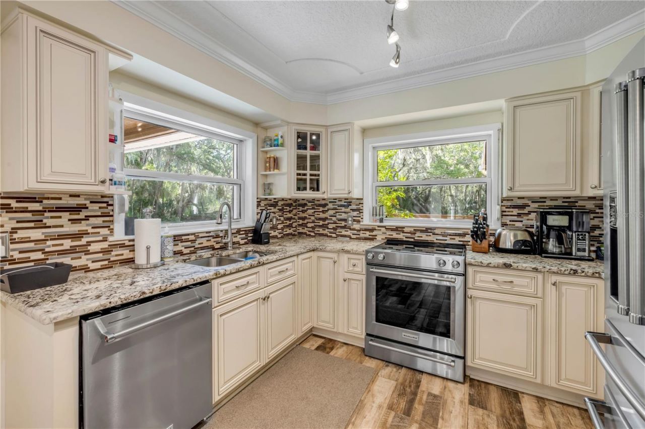 800 Hidden Oaks Lane, Oak Hill, FL 32759 Photo