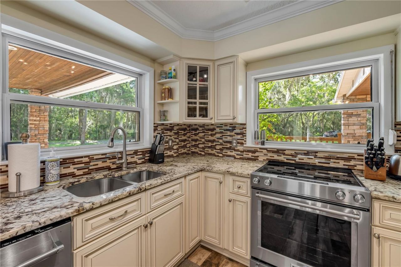 800 Hidden Oaks Lane, Oak Hill, FL 32759 Photo